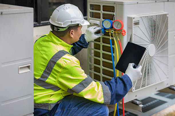 Professional Heat Pump Repair technician working in Lawson, MO